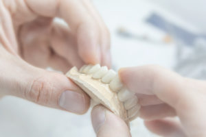 Wymiana protezy ruchomej na stabilizowaną na implantach